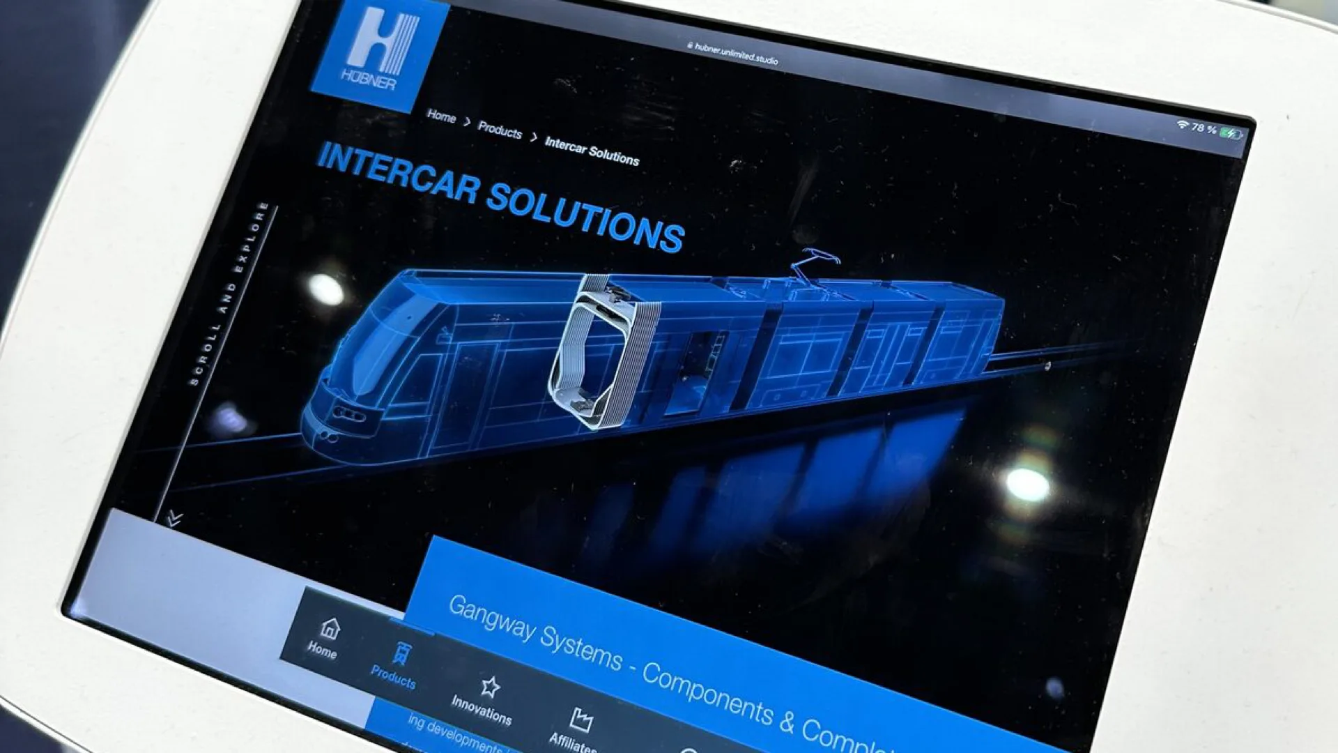 HÜBNER Group - InnoTrans 2024: Intercar Solutions on a Tablet Kiosk at the Booth